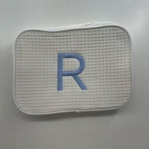 NEW monogrammed “R” cosmetic bag